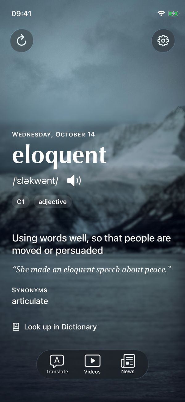 eloquent on a photo of a snowy mountain over a lake.